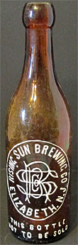 RISING SUN BREWING COMPANY EMBOSSED BEER BOTTLE