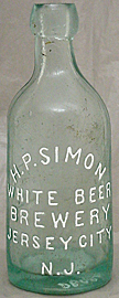 H. P. SIMON WHITE BEER BREWERY EMBOSSED BEER BOTTLE