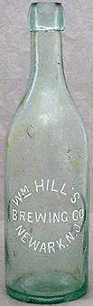 WILLIAM HILL'S BREWING COMPANY EMBOSSED BEER BOTTLE