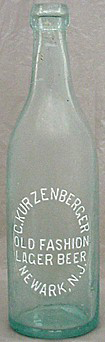 C. KURZENBERGER OLD FASHION LAGER BEER EMBOSSED BEER BOTTLE
