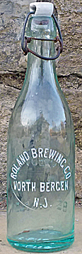 ROLAND BREWING COMPANY EMBOSSED BEER BOTTLE