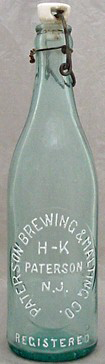 PATERSON BREWING & MALTING COMPANY EMBOSSED BEER BOTTLE