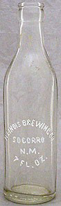ILLINOIS BREWING COMPANY EMBOSSED BEER BOTTLE