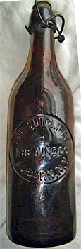 THE SUTCLIFFE BREWING COMPANY EMBOSSED BEER BOTTLE