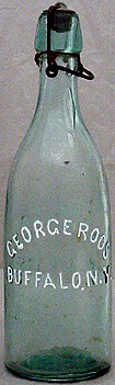 GEORGE ROOS EXCELSIOR LAGER BEER EMBOSSED BEER BOTTLE