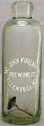THE JOHN KUHLMANN BREWING COMPANY EMBOSSED BEER BOTTLE