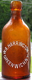 W. A. HARRINGTON WEISS BEER EMBOSSED BEER BOTTLE