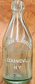 VERNON & OBRYAN WEISS BEER EMBOSSED BEER BOTTLE