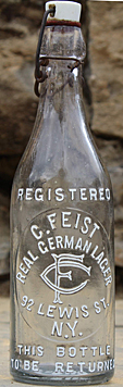 C. FEIST REAL GERMAN LAGER EMBOSSED BEER BOTTLE