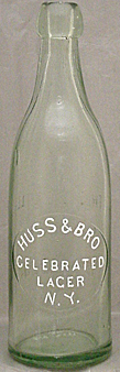 HUSS & BROTHER CELEBRATED LAGER EMBOSSED BEER BOTTLE