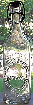 NORTH SIDE BREWING COMPANY EMBOSSED BEER BOTTLE