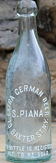 S. PIANA EXTRA GERMAN BEER EMBOSSED BEER BOTTLE