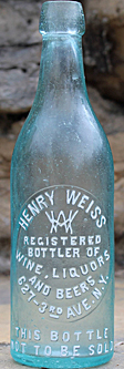 HENRY WEISS BOTTLER OF WINE, LIQUOR AND BEERS EMBOSSED BEER BOTTLE