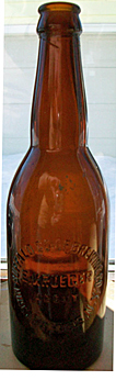 BUFFALO COOPERATIVE BREWING COMPANY EMBOSSED BEER BOTTLE