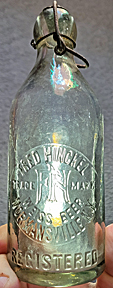 FRED HINCKEL WEISS BEER EMBOSSED BEER BOTTLE