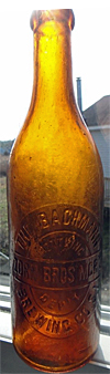 THE BACHMANN BREWING COMPANY EMBOSSED BEER BOTTLE