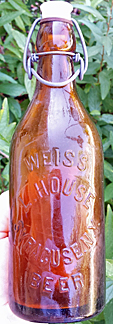 L. HOUSE WEISS BEER EMBOSSED BEER BOTTLE