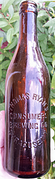 THOMAS RYAN'S CONSUMERS BREWING COMPANY EMBOSSED BEER BOTTLE