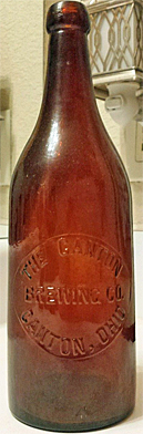 THE CANTON BREWING COMPANY EMBOSSED BEER BOTTLE