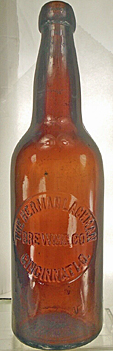 THE HERMAN LACKMAN BREWING COMPANY EMBOSSED BEER BOTTLE