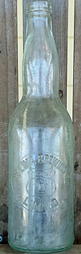 THE LIMA BREWING COMPANY EMBOSSED BEER BOTTLE