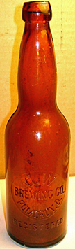 G. W. BREWING COMPANY EMBOSSED BEER BOTTLE