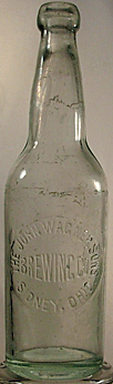THE JOHN WAGNER SONS BREWING COMPANY EMBOSSED BEER BOTTLE