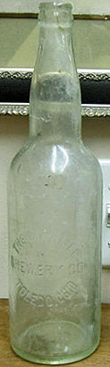 THE MAUMEE BREWERY COMPANY EMBOSSED BEER BOTTLE