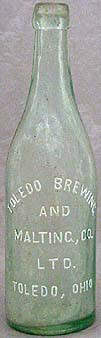 TOLEDO BREWING AND MALTING COMPANY LIMITED EMBOSSED BEER BOTTLE