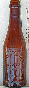 TOLEDO BREWING AND MALTING COMPANY EMBOSSED BEER BOTTLE