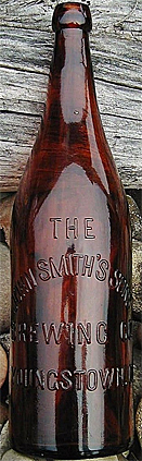 THE JOHN SMITH'S SONS BREWING COMPANY EMBOSSED BEER BOTTLE