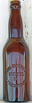 THE JOHN SMITH'S SONS BREWING COMPANY EMBOSSED BEER BOTTLE