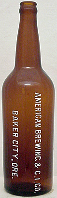 AMERICAN BREWING & CRYSTAL ICE COMPANY EMBOSSED BEER BOTTLE