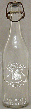 J. KAZMAIER GERMANIA BREWERY EMBOSSED BEER BOTTLE
