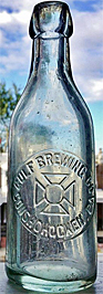 GULF BREWING COMPANY EMBOSSED BEER BOTTLE