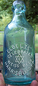 ELBELTS CELEBRATED WEISS BEER EMBOSSED BEER BOTTLE