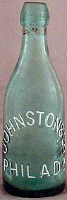 JOHNSTON & COMPANY WEISS BEER EMBOSSED BEER BOTTLE