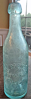 G. MANZ BREWING COMPANY EMBOSSED BEER BOTTLE