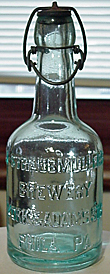 J. STRAUBMULLER'S BREWERY EMBOSSED BEER BOTTLE