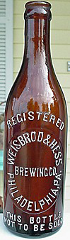 WEISBROD & HESS BREWING COMPANY EMBOSSED BEER BOTTLE