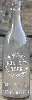 B. WEISS IRON CITY BEER EMBOSSED BEER BOTTLE