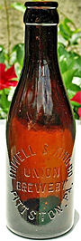 HOWELL & KING COMPANY UNION BREWERY EMBOSSED BEER BOTTLE