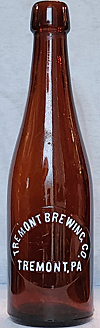 TREMONT BREWING COMPANY EMBOSSED BEER BOTTLE