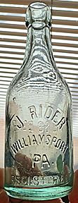 J. RIDER WEISS BEER EMBOSSED BEER BOTTLE