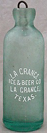 LA GRANGE ICE & BEER COMPANY EMBOSSED BEER BOTTLE
