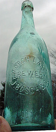 J. BOSCH & CO. TORCH LAKE BREWERY EMBOSSED BEER BOTTLE