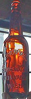 NORTH YAKIMA BREWING AND MALTING EMBOSSED BEER BOTTLE
