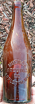 MUENCH BREWING COMPANY EMBOSSED BEER BOTTLE