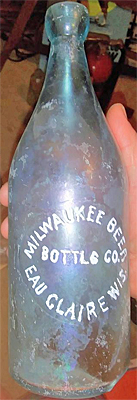 MILWAUKEE BEER BOTTLING COMPANY EMBOSSED BEER BOTTLE