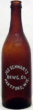 JOSEPH SCHWARTZ BREWING COMPANY EMBOSSED BEER BOTTLE